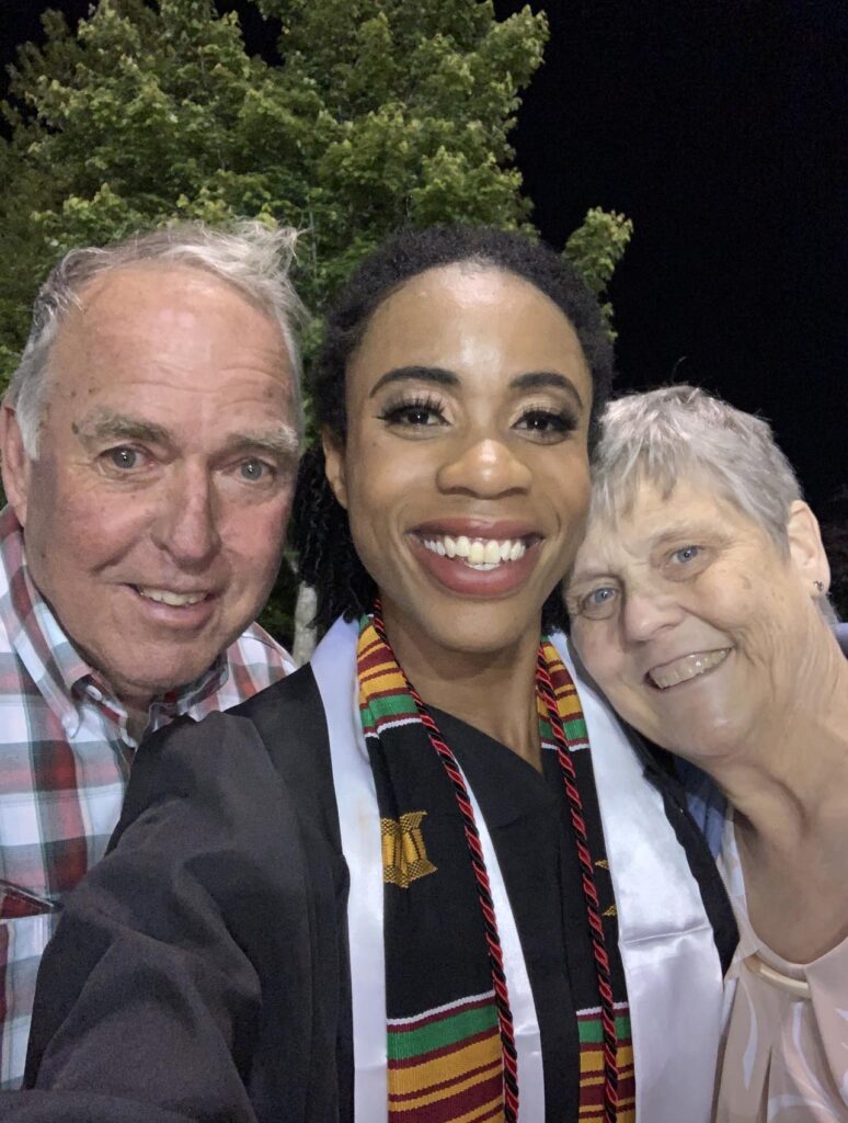 Sierra with Mr. and Mrs. Nation at her graduation from the University of Tulsa