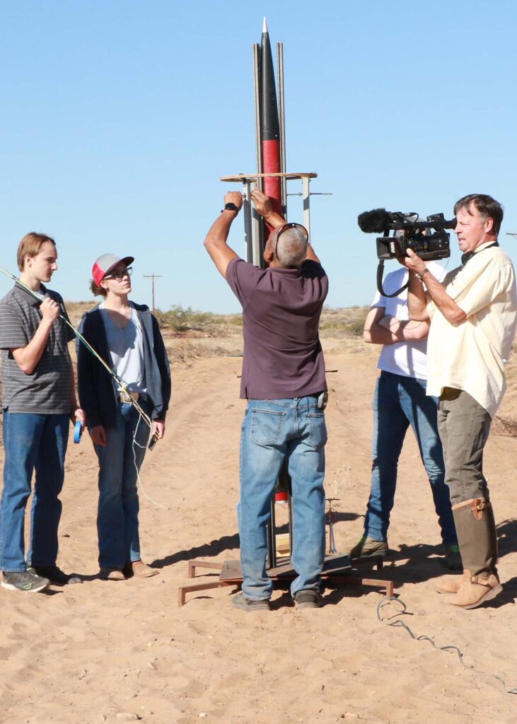 A videographer films Barre Wheatley and Boys Ranch rocket club