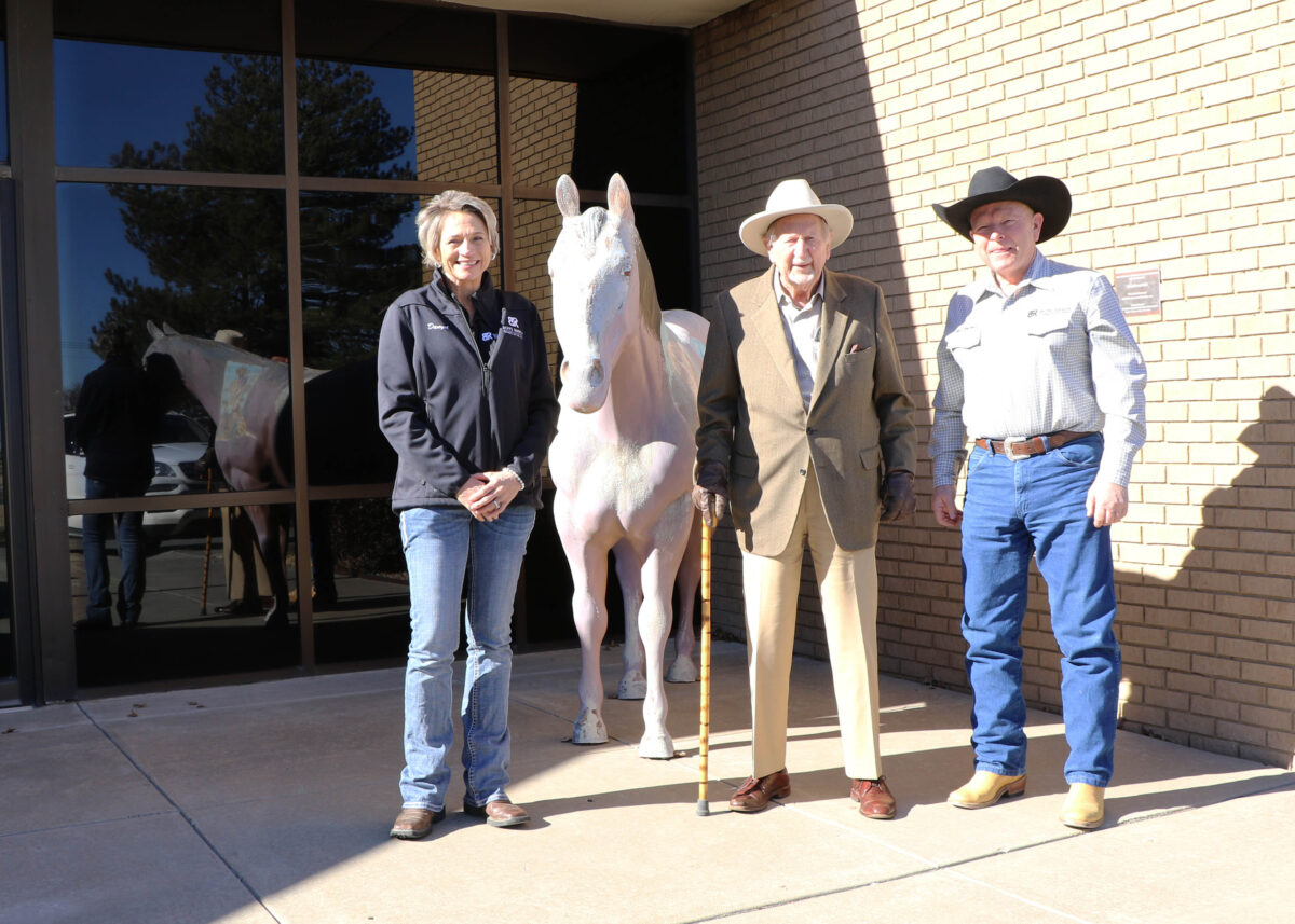 Harold Courson, Danyel Parkhurst and Mike Pacino in front of Courson's office in Perryton, Texas.