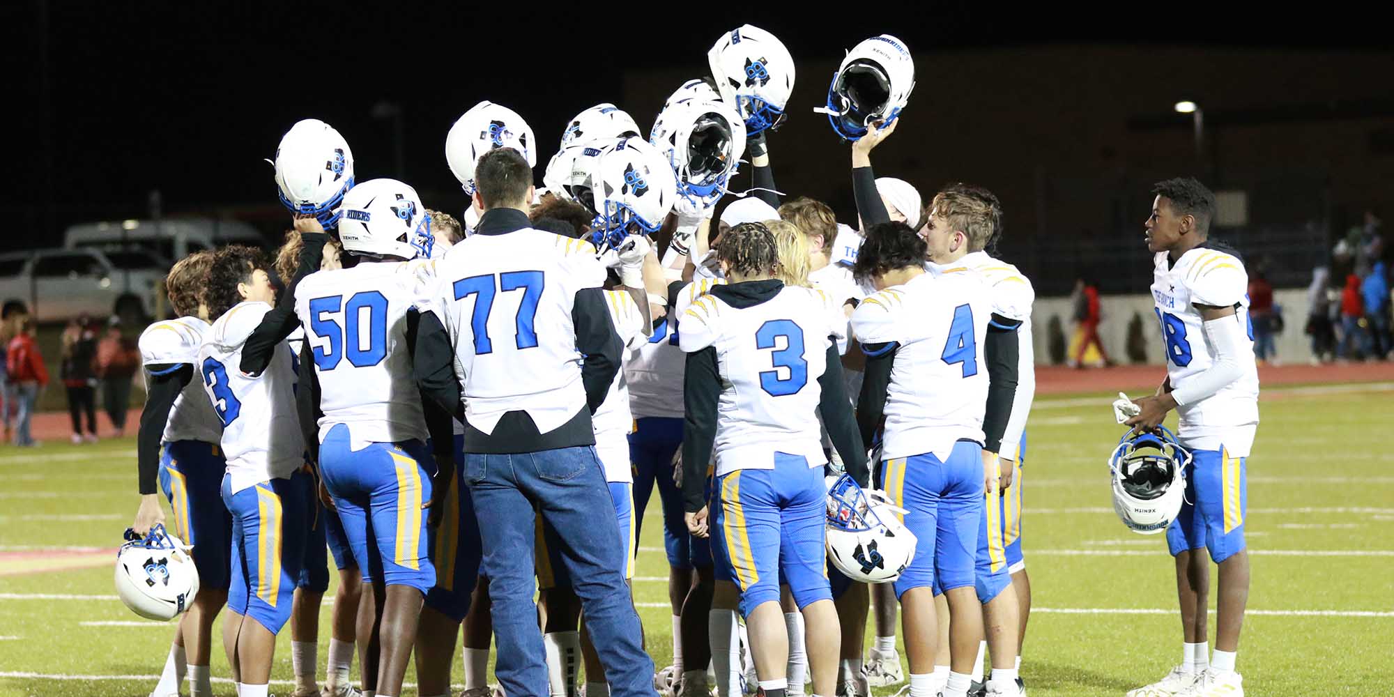 The Boys Ranch football team celebrates the end of the season.