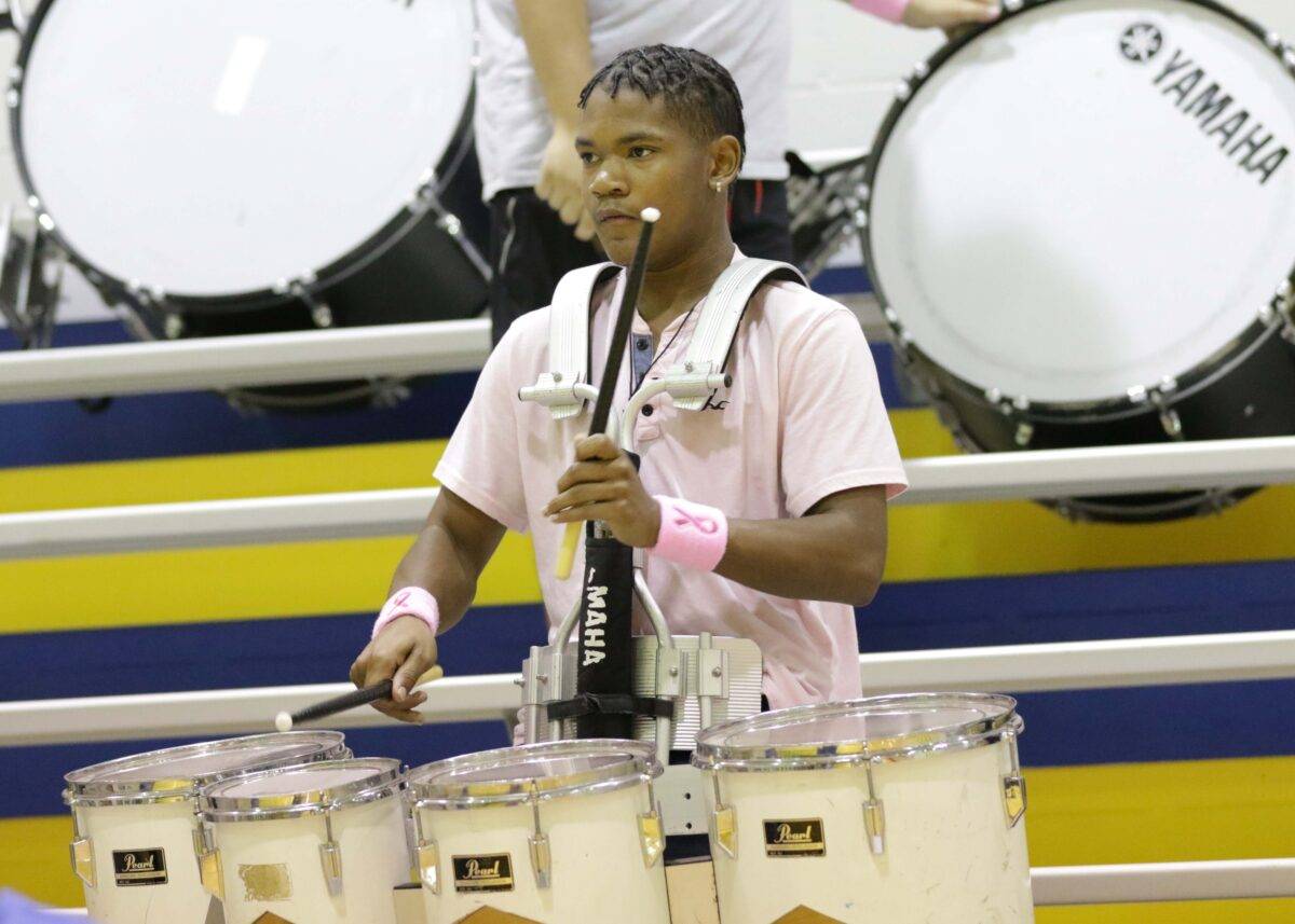 Nathan plays drums in high school pep band.