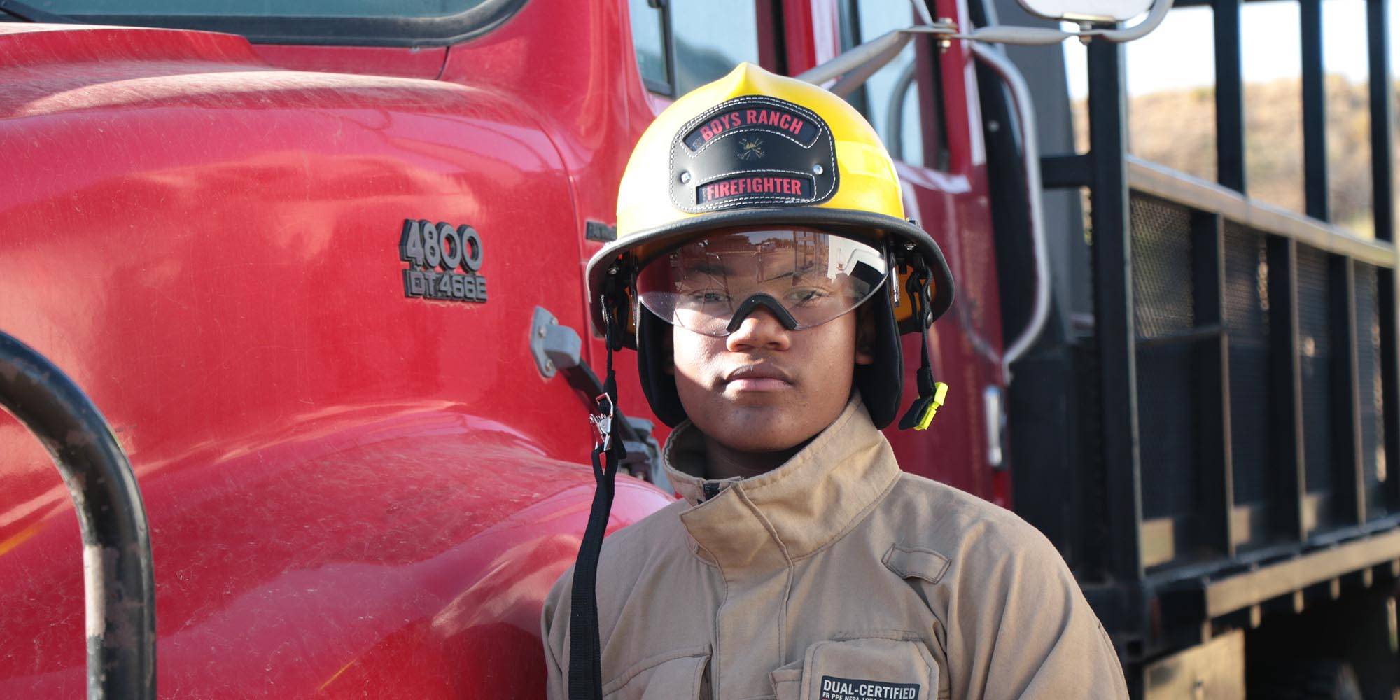 Nathan in firefighting gear